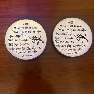 Elegant White Ceramic Coasters with Black Script